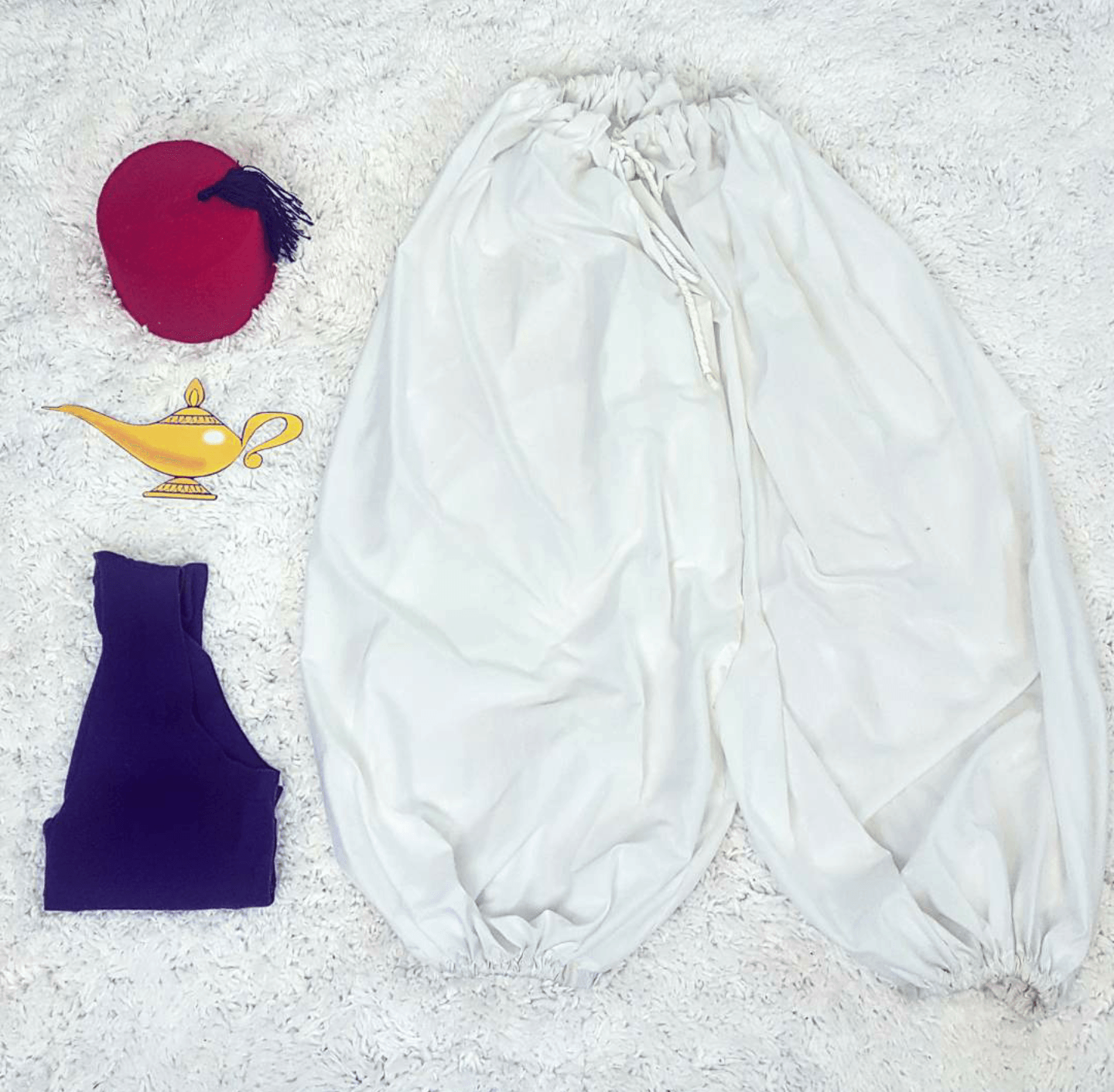 Thrift Store Cosplay Day 14 Aladdin Disney fashion blog post flat lay